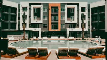 2 outdoor pools, pool umbrellas, pool loungers
