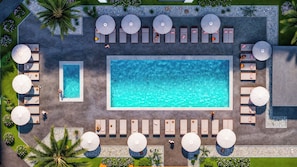 2 piscines extérieures, parasols de plage, chaises longues