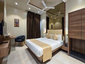 Habitación Deluxe | Escritorio, wifi gratis y ropa de cama 