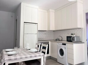 Fridge, oven, coffee/tea maker, toaster