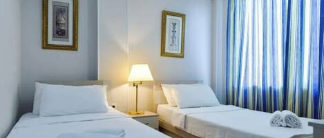 Chambre Ville avec lits jumeaux