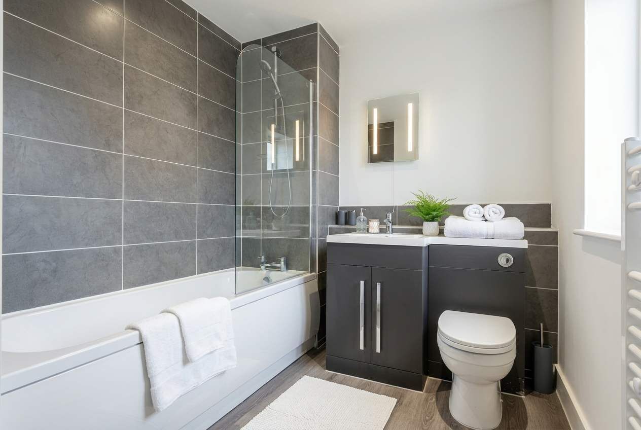 Shower, hair dryer, towels, shampoo