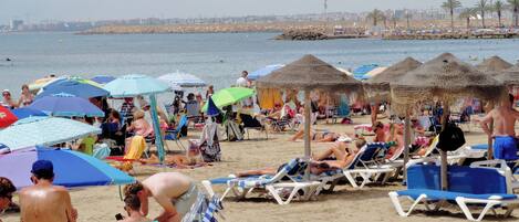 Sun-loungers, beach towels