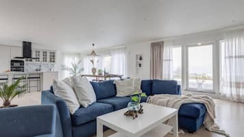 Villa | Living area | TV, fireplace