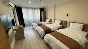 Appartamento Deluxe, balcone | 2 camere, biancheria in cotone egiziano