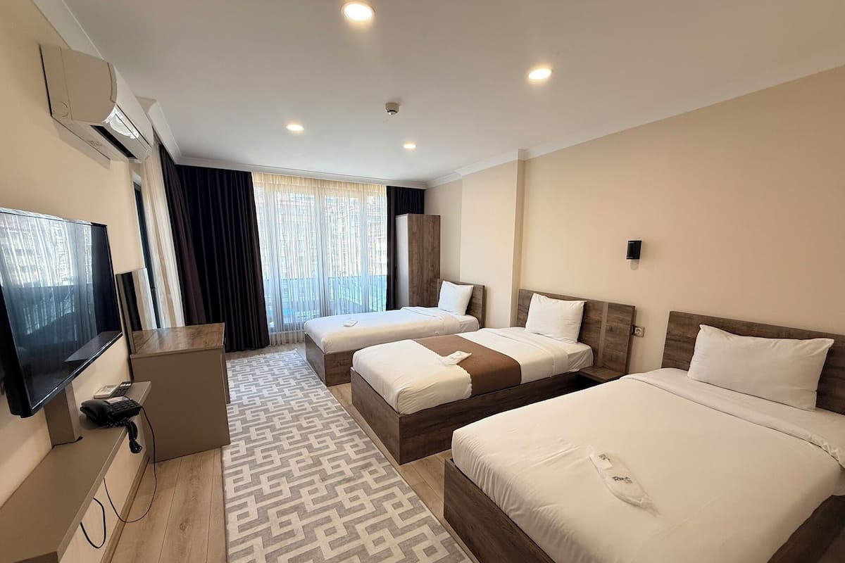 Departamento Deluxe, balcón | Sábanas de algodón egipcio, ropa de cama de alta calidad y edredón