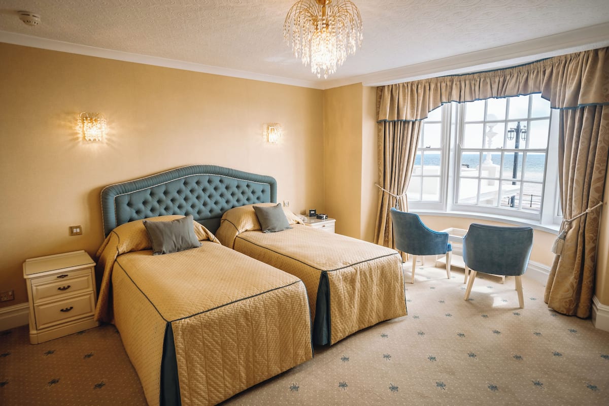 Deluxe Double or Twin Room, Sea View | 1 bedroom, desk, blackout curtains, iron/ironing board