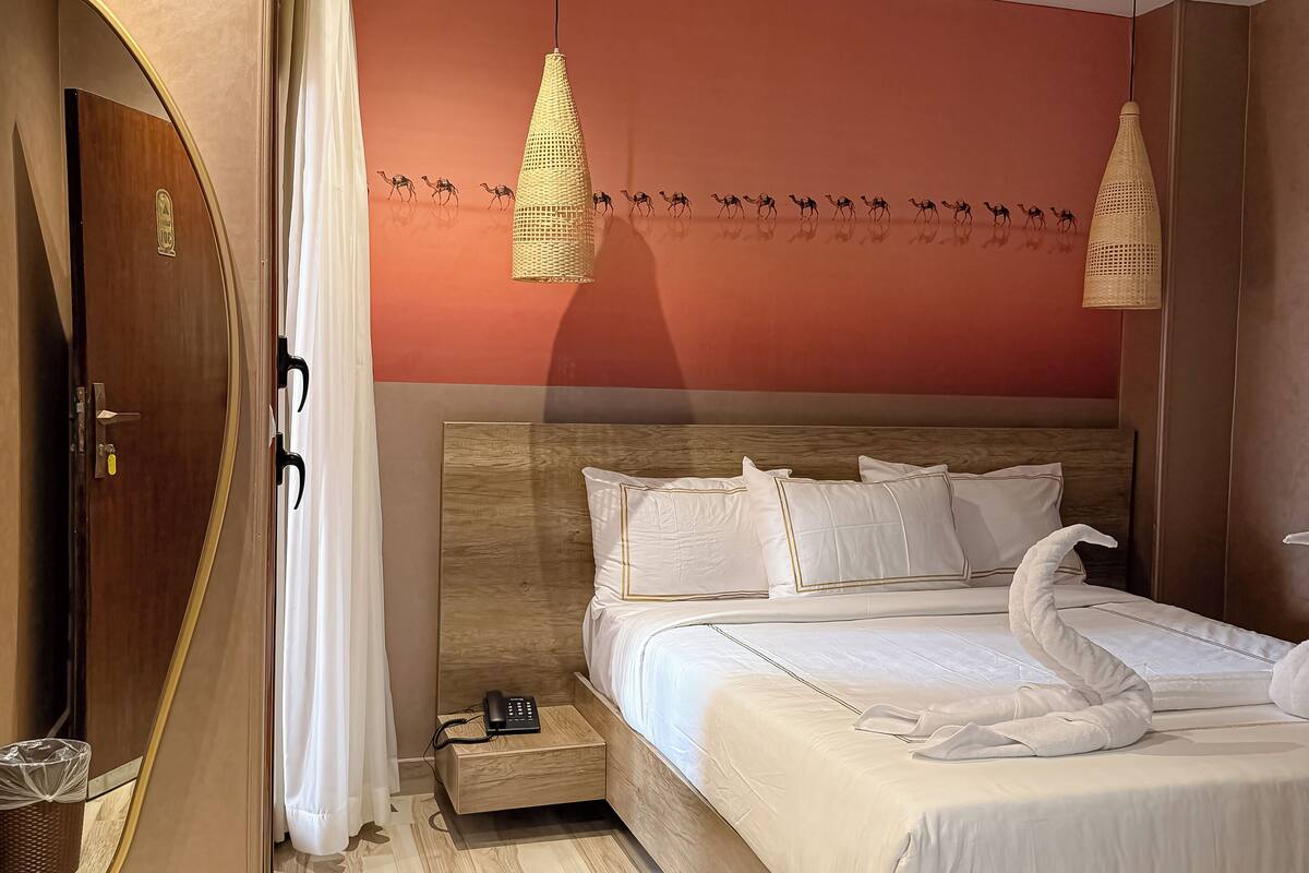 Deluxe Double Room, Mountain View | Minibar, desk, soundproofing, iron/ironing board