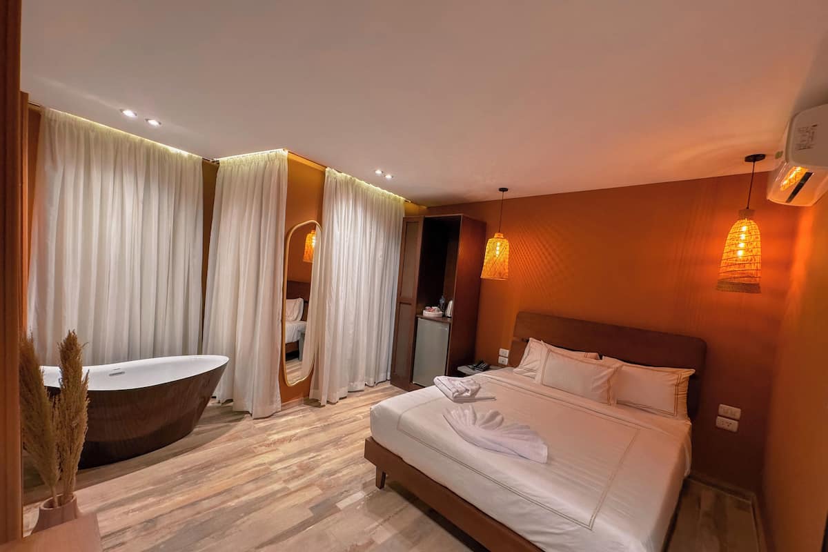 Luxury Double Room, Mountain View | Minibar, desk, soundproofing, iron/ironing board
