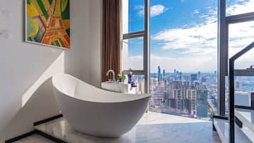 Luxury Studio Suite, 1 King Bed, City View | Down duvets, free minibar, individually decorated