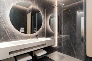 One-Bedroom Comfort Apartment | Bathroom | Eco-friendly toiletries, hair dryer, towels, soap