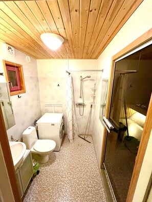 Regadera, secadora de cabello, jabón, papel de baño