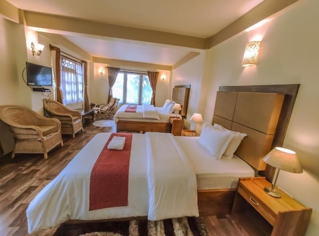 Premium bedding, desk, laptop workspace, iron/ironing board. Misson Valley Kalimpong