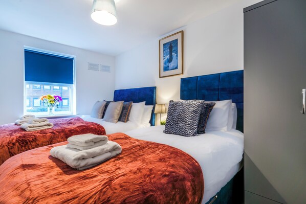 2 quartos, ferros/tábuas de passar roupa, Wi-Fi, roupa de cama