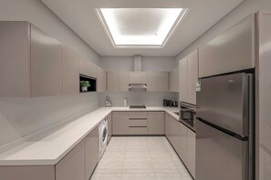 Apartment | Private kitchen | Fridge, microwave, oven, stovetop
