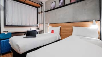 Huoneisto, 2 yhden hengen sänkyä | Tallelokero huoneessa, äänieristys, silitysrauta/-lauta