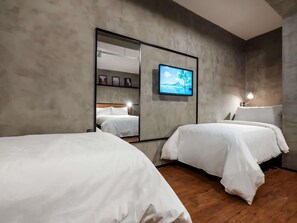 Apartament, diversos llits | Caixa forta a l'habitació i habitacions insonoritzades 