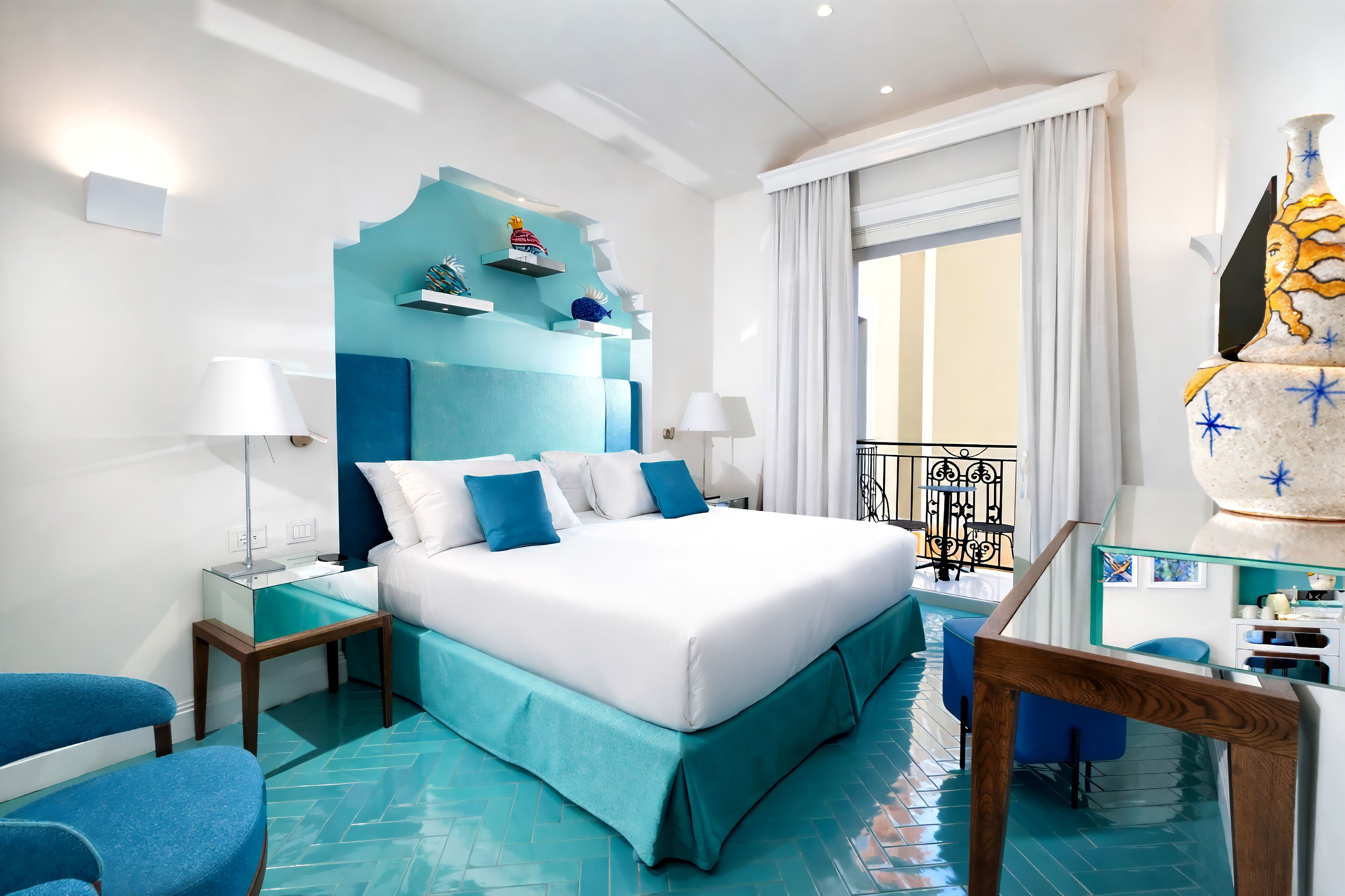 Classic Room, Partial Sea View | Minibar, in-room safe, desk, blackout drapes