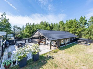 Outdoor dining - 4 Person Holiday Home in Norre Nebel (Norre Nebel)