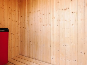 A wooden interior with a red object on the left. - 6 Person Holiday Home in Aabenraa (Aabenraa)