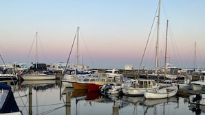 A marina with various boats docked, including sailboats and motorboats. - 6 Person Holiday Home in Albaek (Aalbaek)