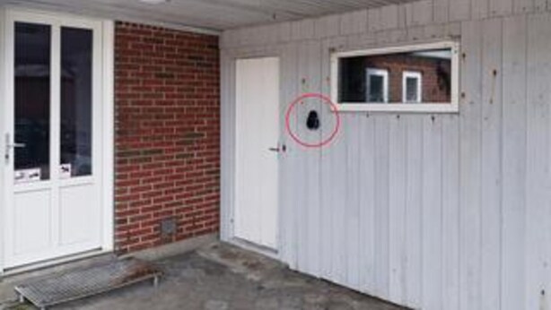 A building with a white exterior, a brick wall, and a door. - 12 Person Holiday Home in Thyboron (Thyborøn)