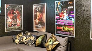 A room with a grey sofa and three posters on the wall. - 4 Star Holiday Home in Ullared (Ullared)
