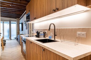 Fridge, microwave, dishwasher, coffee/tea maker