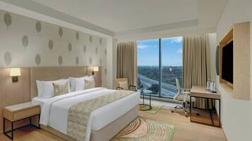 Room, 1 King Bed, City View | In-room safe, desk, soundproofing, iron/ironing board