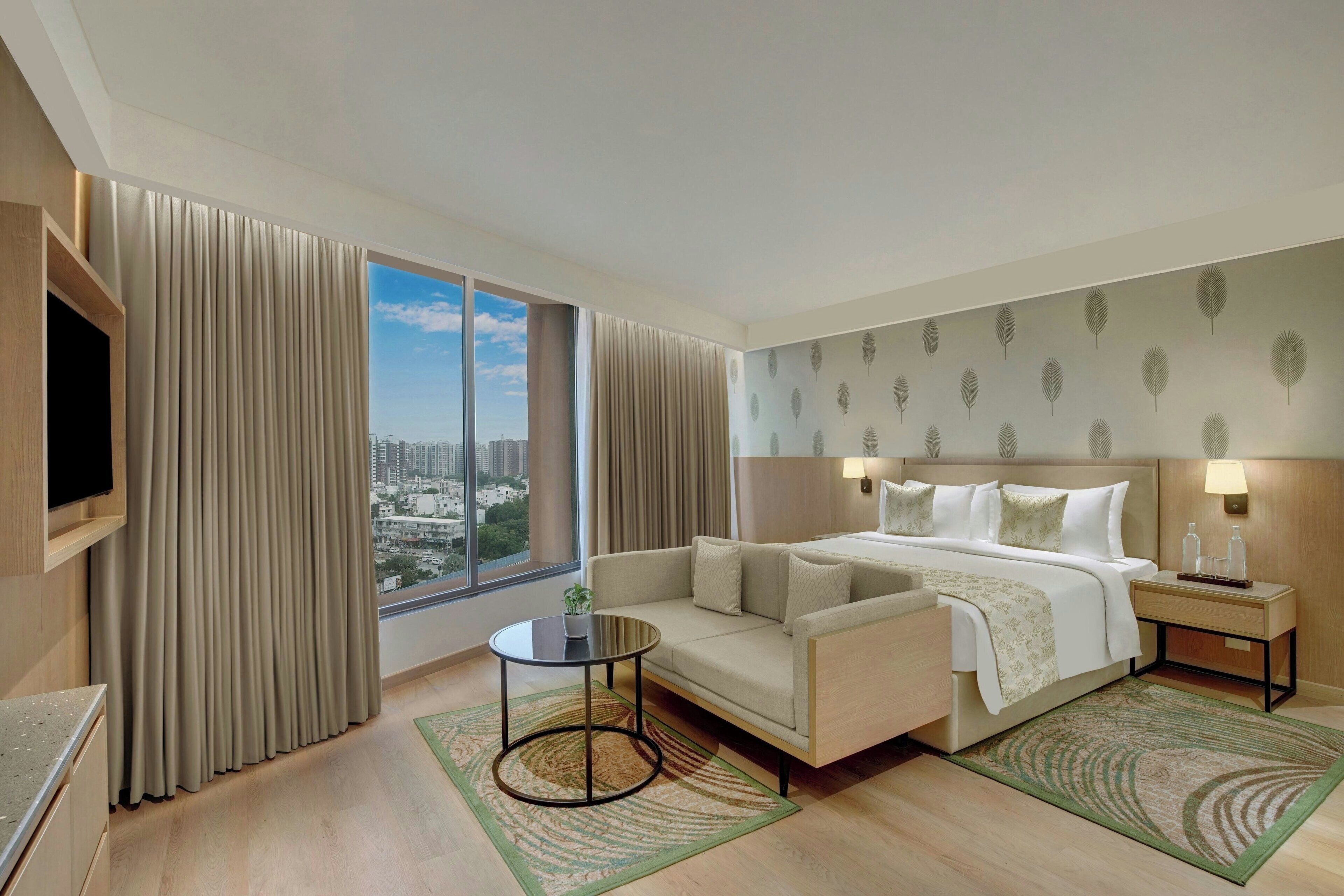 Premium Room, 1 King Bed, City View | In-room safe, desk, soundproofing, iron/ironing board