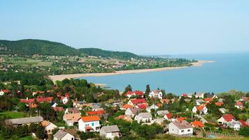 A coastal village with houses and a beach.