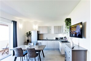 Fridge, microwave, oven, stovetop - Apartment with a Sea View (Tkon)