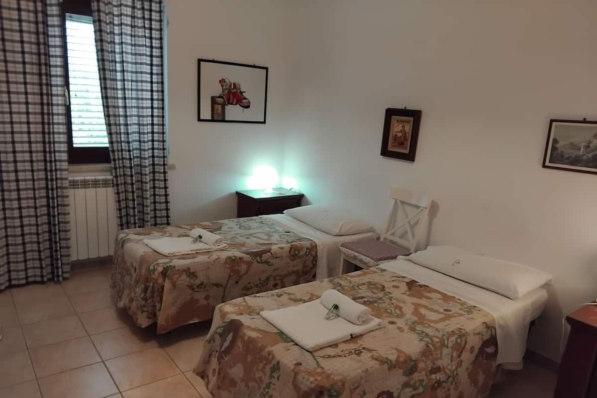 Desk, laptop workspace, free WiFi, bed sheets