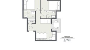 A floor plan of a hotel with a sauna, a kitchen, and a dining area.