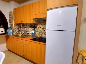 Fridge, microwave, coffee/tea maker, toaster