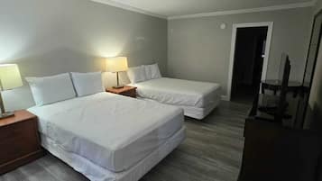 Room (2 Queen Bed & 1 Full Bed) | Desk, iron/ironing board, free WiFi, bed sheets
