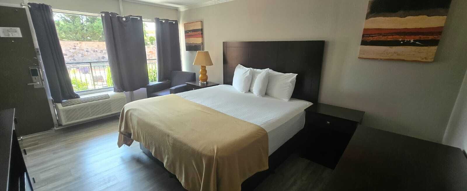 Room, 2 Queen Beds, Roll-in Shower, Non Smoking | Desk, iron/ironing board, free WiFi, bed sheets