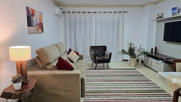 Traditional Apartment | Living area | 50-inch Smart TV with digital channels