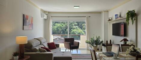 Traditional Apartment | Living area | 50-inch Smart TV with digital channels