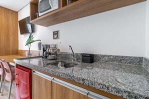 Fridge, microwave, coffee/tea maker, toaster