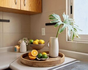 Fridge, microwave, stovetop, coffee/tea maker