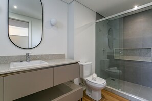 Shower, hair dryer, towels, toilet paper