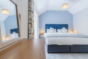 2 bedrooms, premium bedding, iron/ironing board, bed sheets