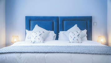 2 bedrooms, premium bedding, iron/ironing board, bed sheets