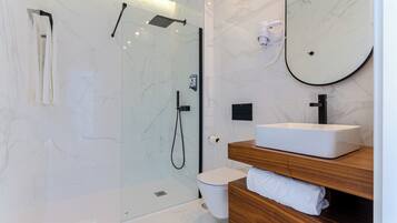 Deluxe Double Room, Pool View | Bathroom | Shower, rainfall showerhead, hair dryer, towels