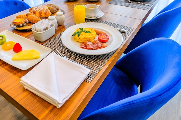 Free daily buffet breakfast