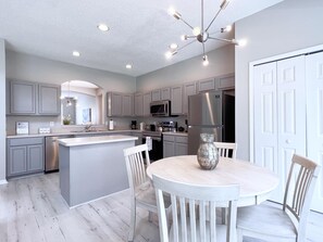 Fridge, microwave, oven, stovetop - Spacious 7Bd Pool Home in Terra Verde Resort-211HBL (Kissimmee)