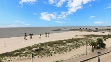 On the beach, sun-loungers, beach towels