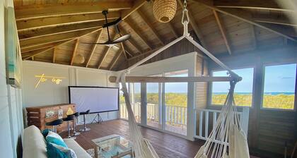 A Spacious Ocean View Villa, steps away from Punta Cocos bioluminescence beach.
