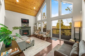 Smart TV, fireplace, books, offices